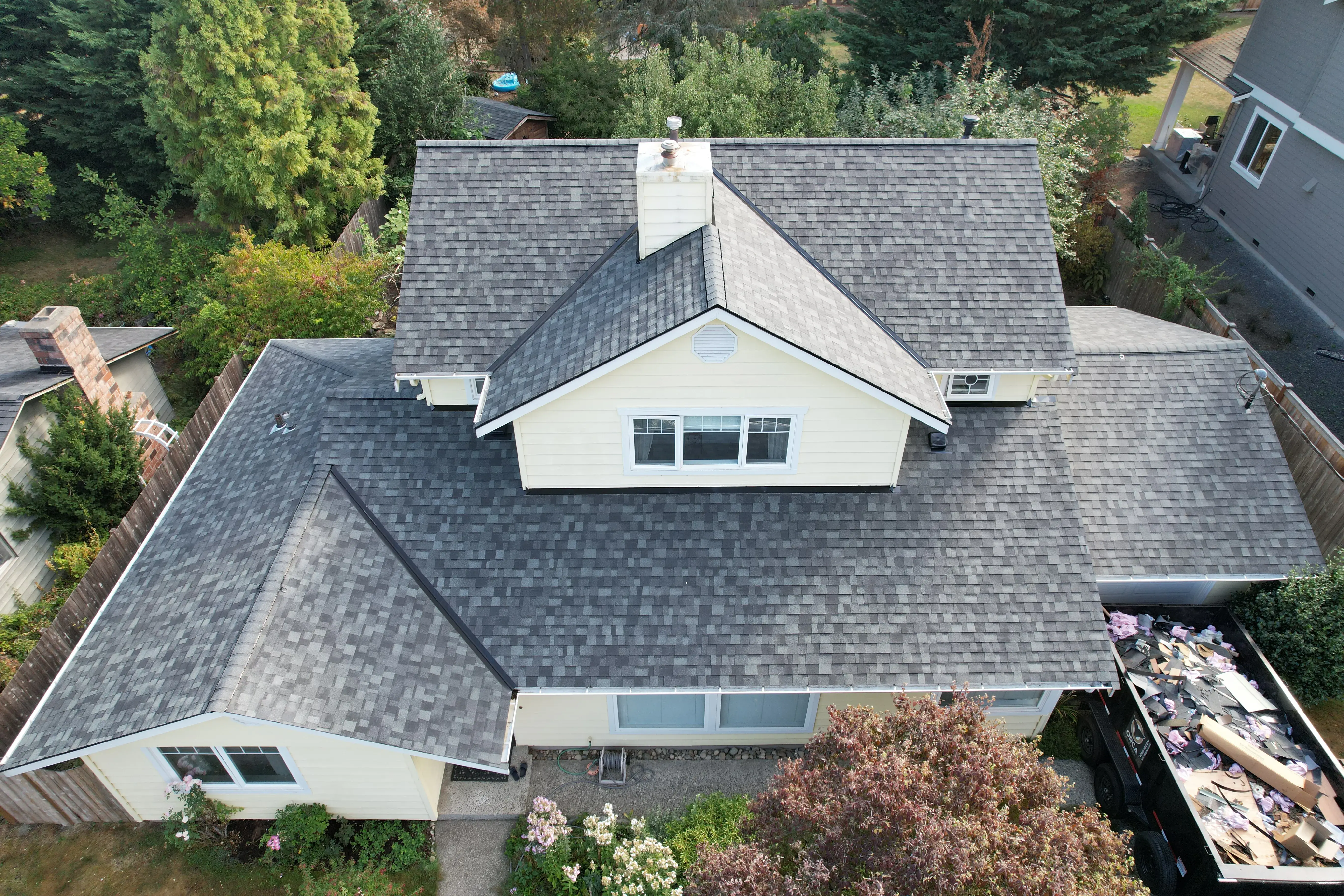 Completed premium asphalt shingle roof — built for PNW weather